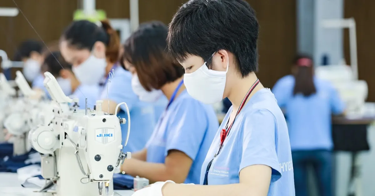 Private label athleisure manufacturer sewing workers at Thygesen Vietnam