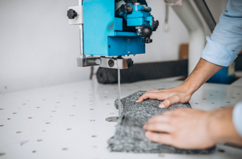 A cut and sew manufacturer handles the full process of cutting fabric