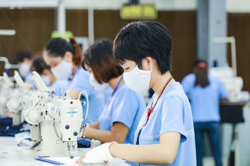 The clothing manufacturer manages the sewing and assembly process, turning prepared materials into finished garments based on approved patterns and technical standards