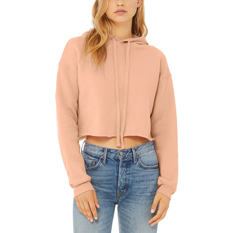 The cropped hoodie features a shortened body length that typically ends at or above the waist
