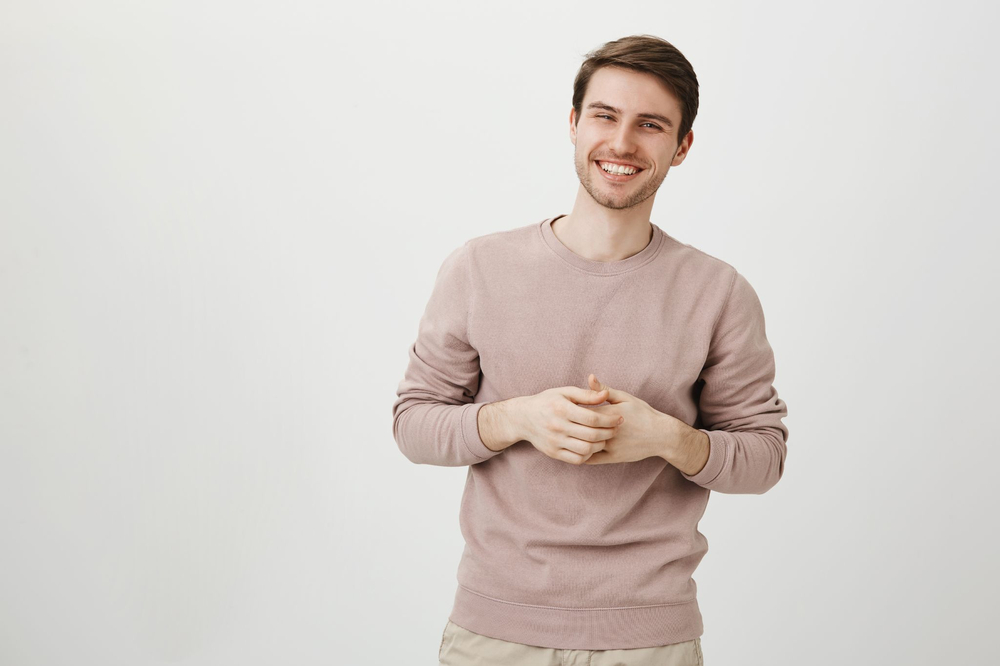A sweatshirt is a casual long-sleeved top typically made from cotton or cotton-blend fabric, often featuring a soft fleece or French terry interior for added warmth and comfort