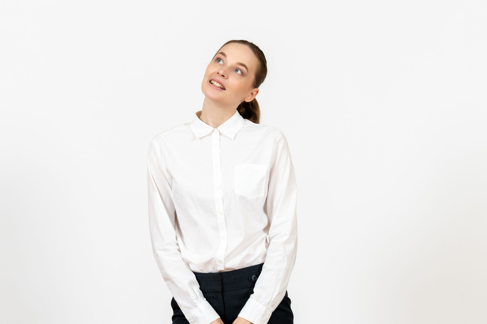 The button-down shirt is a classic woven top with a collar and front buttons, offering versatile styling through customizable fits, seasonal fabrics, and refined details.