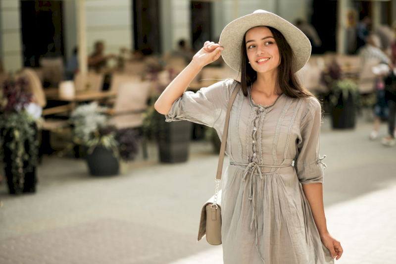The tunic is a relaxed, longline top extending past the hips, designed in lightweight, draping fabrics with versatile hem details to offer stylish coverage and easy layering